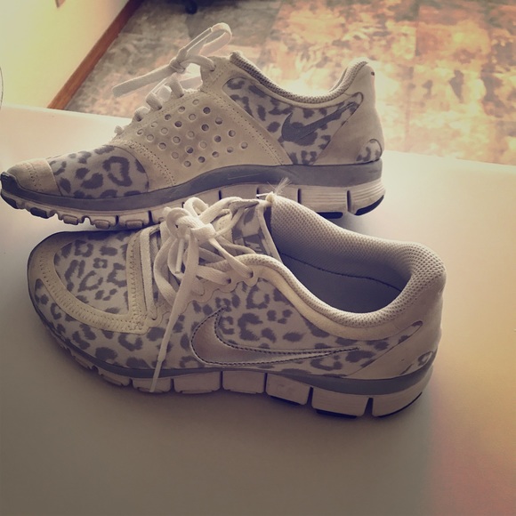 white cheetah nike shoes